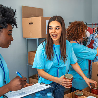 Group of employees working in a volunteer thrift store.